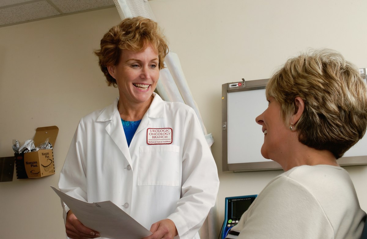 Clinician consulting with a patient at a modern UAE clinic