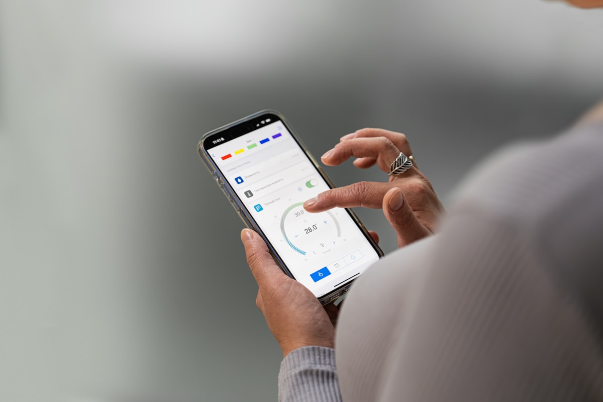 Hands using a mobile application on a smartphone